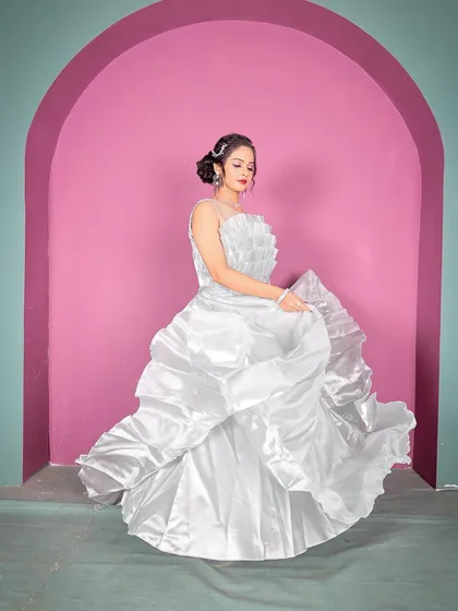 The movement of this gown is spectacular. Renting this piece allows you to have a high-impact look for your photos without the high cost.