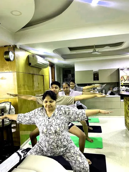 Bringing wellness to the workplace is one of my key services. This is a corporate yoga session I conducted for a company in Delhi, helping the team de-stress and find balance with poses like Virabhadrasana II.