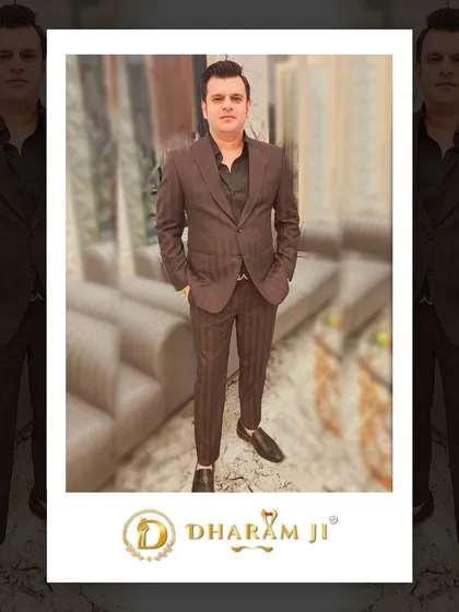 A happy client in a brown pinstripe suit. The fit is perfect, creating a sharp and professional look for him.