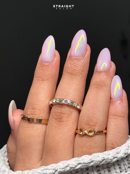 A different angle of the stunning opal chrome nails. The high-shine, multi-tonal effect is incredibly popular and makes for a truly magical manicure.