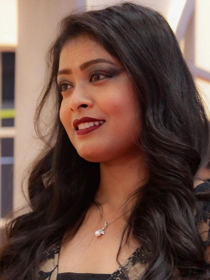 A model showcasing an expert haircut demonstrated by our team at the Professional Beauty Event in Kolkata. We actively participate in industry events to share our expertise.