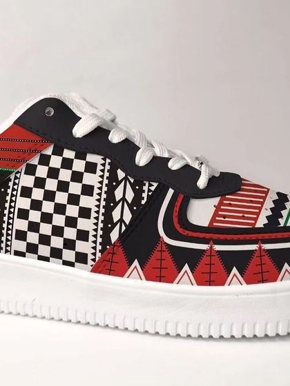 For this Liberty Shoes design, I took inspiration from the geometric weaves of Naga shawls from North East India. The bold, graphic patterns in red, black, and white make a powerful statement.