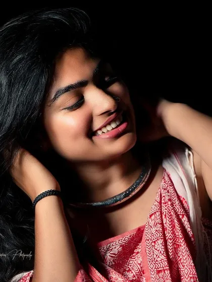 A happy, candid moment in the studio. The makeup is designed to look great whether you are posing or caught in a moment of laughter.