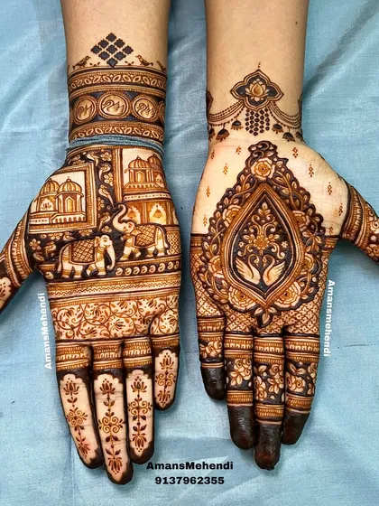 A matching pair of hands with different but complementary designs. One hand features a royal procession with elephants, while the other has a large paisley filled with swans.