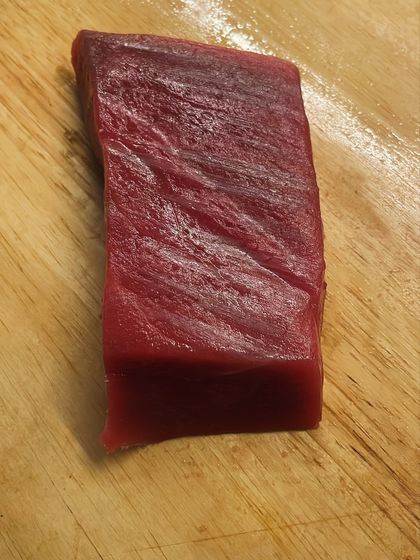 The starting point for an exceptional dish: a pristine block of Bluefin tuna. The quality of the ingredients is paramount in my cooking.