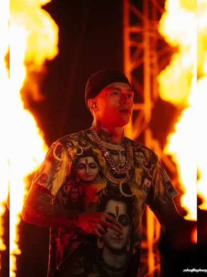 Central Cee commands the stage at Rolling Loud India, framed by explosive pyrotechnics. This shot captures the raw energy and spectacle of a headline performance, freezing a peak moment with perfect timing and intense lighting.