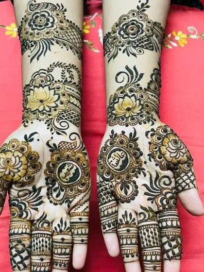A duplicate image of the beautiful lotus and rose design with hidden names.