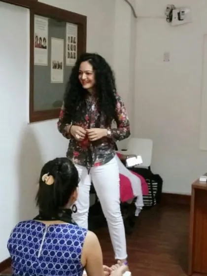 A candid shot from a past workshop where I was explaining the role of an Image Consultant. My work is a partnership with my clients, guiding them on a transformational journey to align their inner self with their outer image.