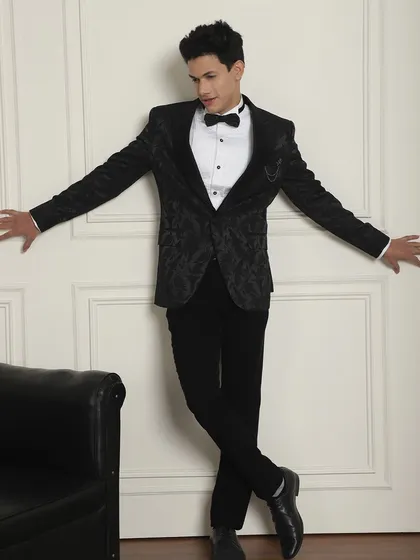 Engagement, cocktail, or reception, a tuxedo fits all. This black patterned tuxedo is a classic choice, customized to your measurement for a dream fit.