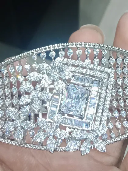 A royal-looking, wide American Diamond bracelet. This single piece can make a huge impact and is perfect for cocktail parties.