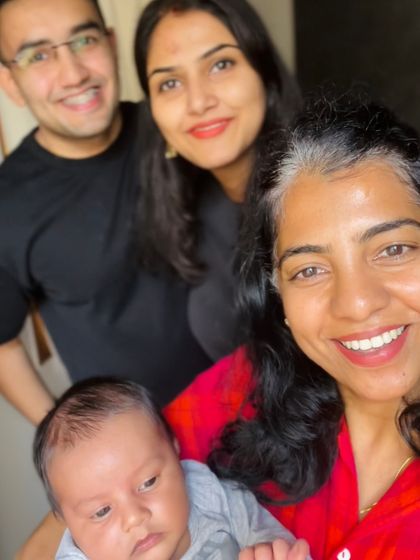 A selfie with a happy family and their new baby. These moments of connection are what make my job so rewarding.