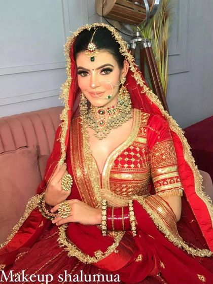 A classic red and gold combination. This outfit and the matching jewellery set are available for rent or purchase.