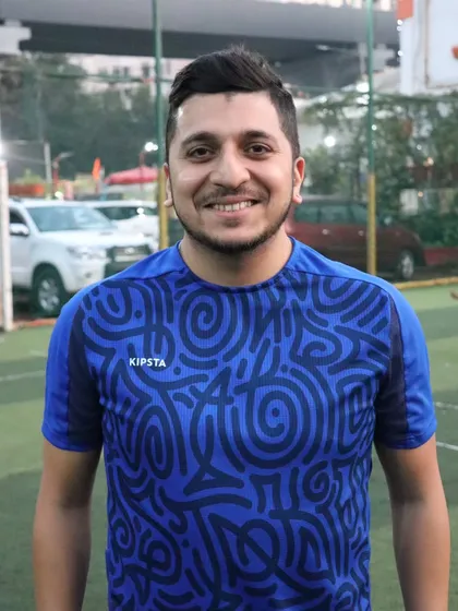 Coach Shadab, the heart of the academy, looking happy and proud on the training ground.