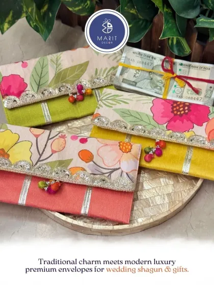Traditional charm meets modern luxury. This collection of premium envelopes for wedding 'shagun' and gifts comes in a variety of vibrant, floral designs.