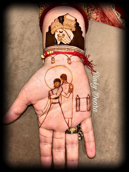 The outline of the Karwa Chauth couple portrait. This shows the foundation of the design before shading and details are added.