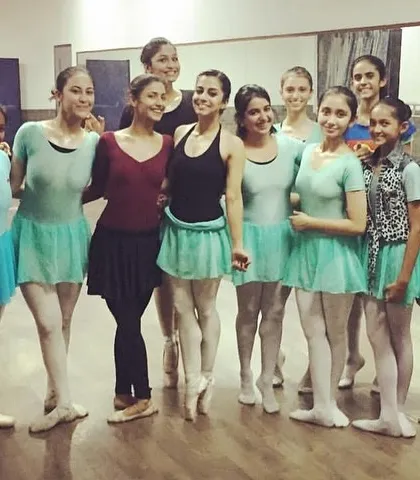A happy group photo with my students in the studio. This is where we practice, learn, and grow together. Seeing them stand tall and proud in their ballet attire after a good class makes my heart full.