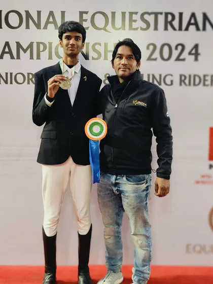 A proud moment with one of our riders at the JNEC 2024. We celebrate every success, like this Team Silver medal in CH-1 show jumping, as a family.