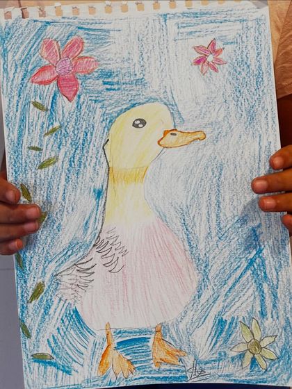 A lovely duck portrait with a textured blue background, showing the artist's exploration of different coloring techniques.