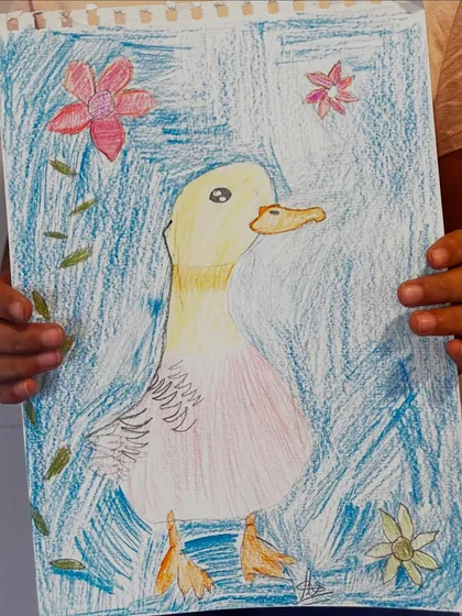 A lovely duck portrait with a textured blue background, showing the artist's exploration of different coloring techniques.
