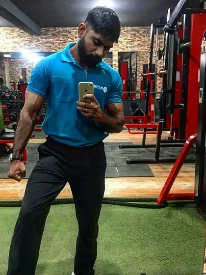A post-workout selfie, checking the arm pump.