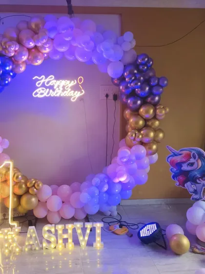 Another angle of the unicorn-themed first birthday, showing the setup in a home environment.