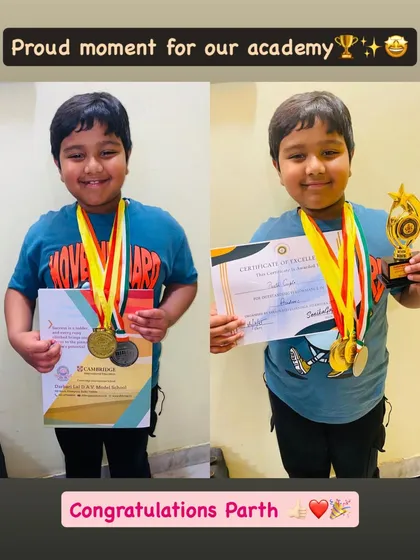 A truly proud moment for the academy. Here is my student Parth, beaming with his certificates, medals, and trophy. It's wonderful to see his hard work and talent recognized.