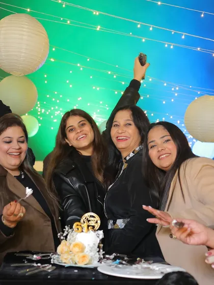 Happy moments captured in front of a backdrop we designed. Our goal is always to create a beautiful setting that enhances the joy of your celebration.