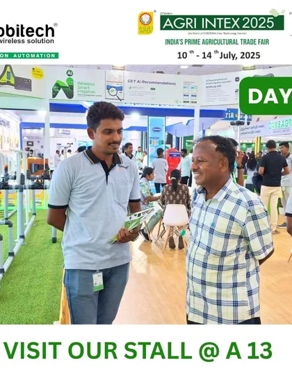 A smiling visitor interacting with our team at the Agri Intex stall.