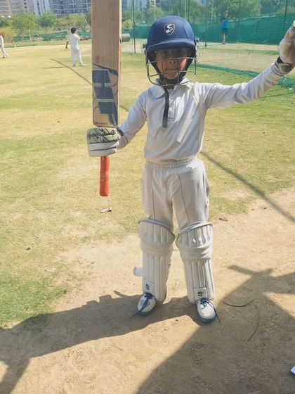 Another young Tiger, fully kitted out, celebrating his achievement. We provide the right gear and guidance for our players to succeed.