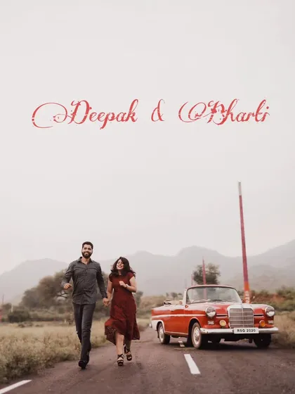 Running towards forever. This playful and dynamic shot captures the couple's joyful energy, with the vintage car and rolling hills creating a beautiful, cinematic backdrop for their pre-wedding adventure.
