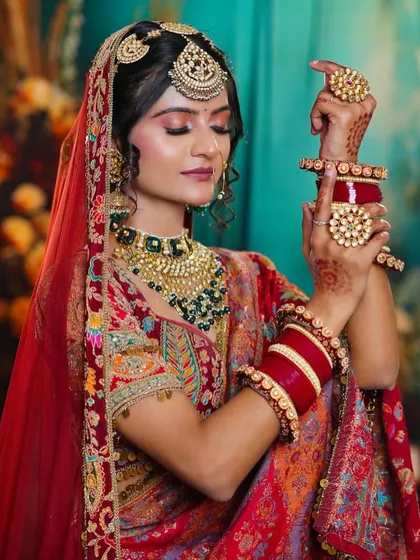 A close-up showcasing the soft glam eye makeup and perfectly coordinated jewelry. Our students learn to pay close attention to the smallest details.