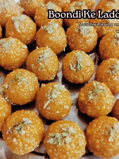 A tray full of our delicious Boondi Ke Laddoos, garnished with chopped pistachios. These are prepared in large batches for a Diwali party catering order, ready to be packed and sent out.