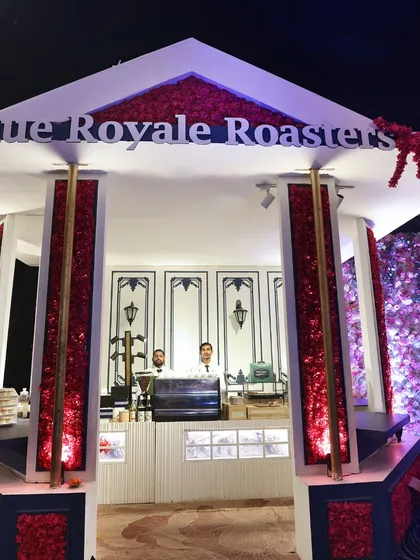 The "Rue Royale Roasters" coffee bar, a chic and stylish station designed to offer guests artisanal coffee in a beautiful, custom-built setting.