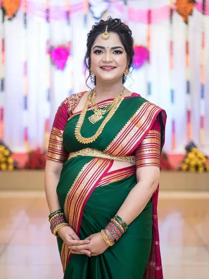 A personal moment from my own baby shower. I chose a traditional South Indian look with a beautiful green KSIC Mysore silk saree, temple jewellery, and soft, glowing makeup to celebrate this special milestone.