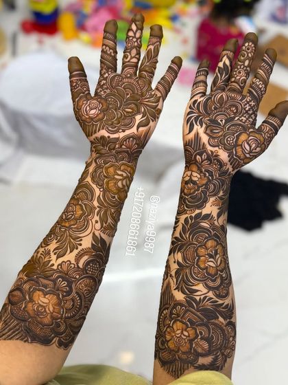 Another angle of this intricate floral work. I love how the patterns wrap around the arm, creating a continuous piece of art.