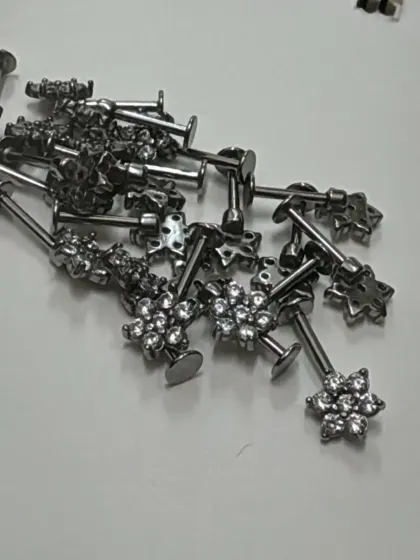 Our star-shaped studs are a popular choice for building a celestial-themed ear stack. All our jewelry is sterilized and ready for fresh piercings.