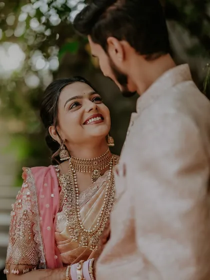 A romantic close-up of the couple. Even without the full floral set, you can see how flowers can be incorporated into the main wedding events.