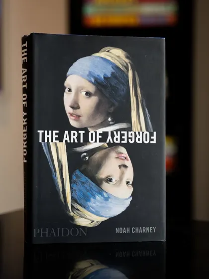 The cover of 'The Art of Forgery' by Noah Charney. This fascinating read is part of our curated library, exploring the intriguing underworld of art.