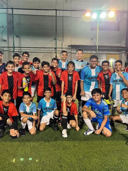 Our Under-13 players with the Usha Nagar FC team after a friendly match, an amazing experience for everyone involved.