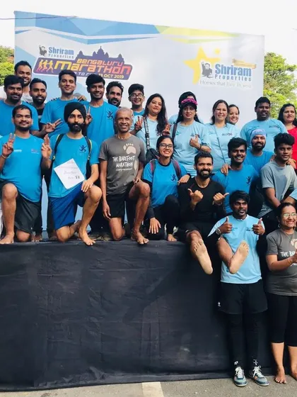 A big group photo with a running legend. Our community provides opportunities to meet and learn from some of the most experienced runners in the country during our training meetups.