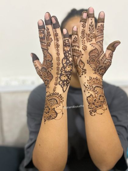 An elegant Indo-Arabic design that focuses on flowing vines and paisley shapes, leaving plenty of open skin for a modern and graceful look.