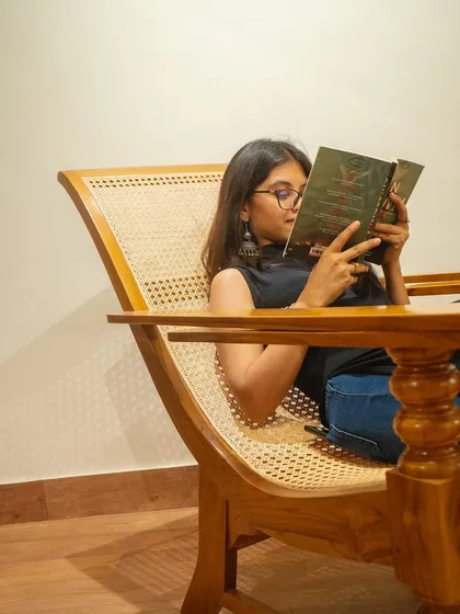 The 'Orca' lounge chair is the perfect companion for getting lost in a good book. Its ergonomic design and breathable rattan surface provide comfort for hours.