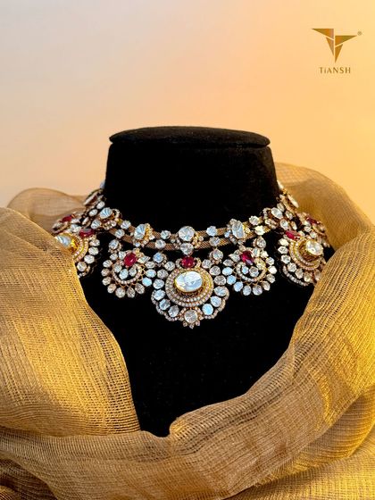 This regal polki diamond and ruby choker is a stunning addition to my latest collection. It is a masterpiece of traditional craftsmanship, perfect for brides or anyone looking to make a dazzling entrance at a festive soirée.