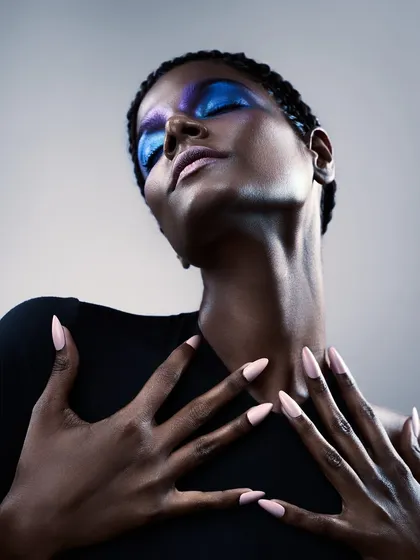 This is a beauty shot focused on color and texture. The vibrant blue eyeshadow is the hero, and the lighting is crafted to make it stand out while keeping the skin looking flawless and real. It shows how I approach retouching, balancing artistic color grading with natural results.