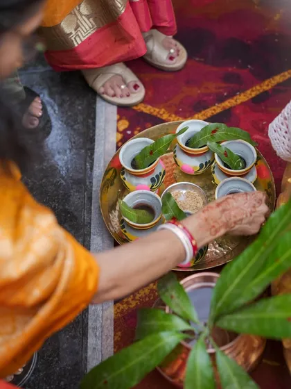 A detail shot of the items used in a traditional pooja during a wedding ceremony. Capturing these details helps to tell the complete cultural story of the day.