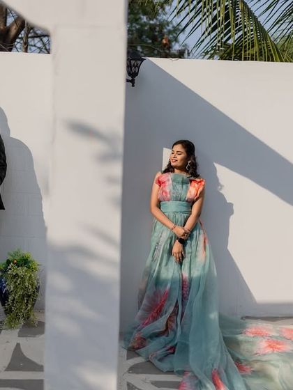 A modern, editorial-style portrait with strong shadows and clean lines. This demonstrates a more fashion-forward approach to couple photography.