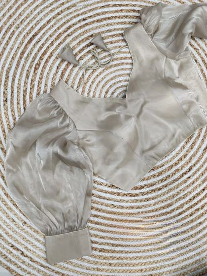 Another view of the subtle grey organza blouse.