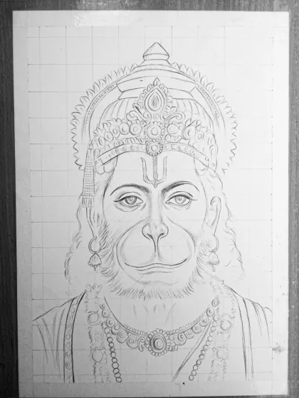 The foundational outline sketch of the Hanuman portrait, showing the grid used to map out the intricate crown and facial features.