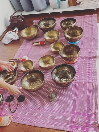 The arrangement of bowls for a sound bath is an art in itself. The different sizes and metals produce a range of frequencies that work on various energy centers in the body, promoting balance and harmony.