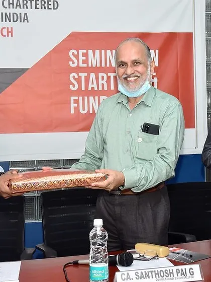 Receiving a token of appreciation after my talk on startups and fundraising at the ICAI Kozhikode branch.
